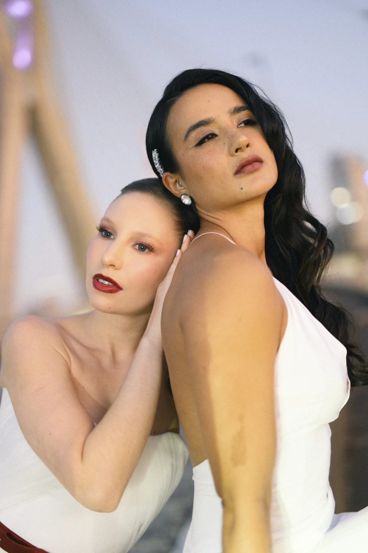 Close portrait featuring two distinct beauty looks.